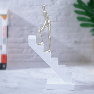 Abstract White Statue Of Man Climbing Stairs - Motivational Decor For Zen Office & Home Inspiration by Accent Collection