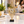 Gold geometric tabletop statue with a clear central orb