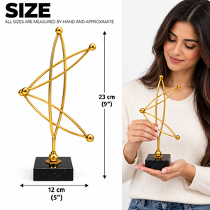 Gold metal statue size guide showing approximately 23 cm high and 12 cm wide