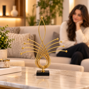 Gold decorative tabletop statue styled in a living room