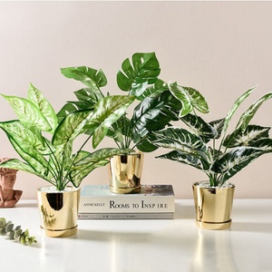 Golden Ceramic Planter with Faux Plant - 18" High by Sona Casa